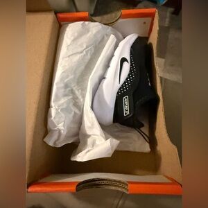 Nike Kids' Black and White Slip-On Sneaker 3C BABY 
new in box never worn!
